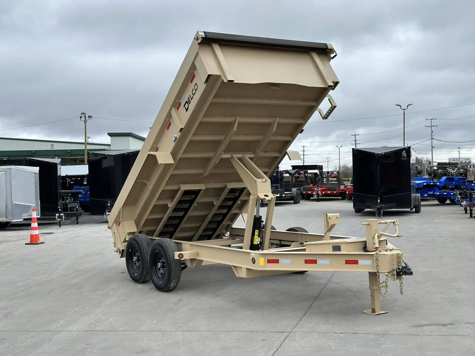 Aff33b0be16f040f99c1e31973b556edf2-1536x1152-1 7×14 7TON Telescopic Dump Trailer with alum wheels - Image 1