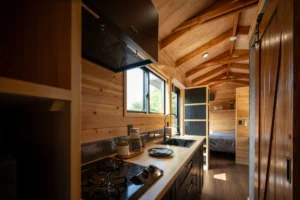 Single-floor tiny house fits working and living spaces into 21 ft - Image 2